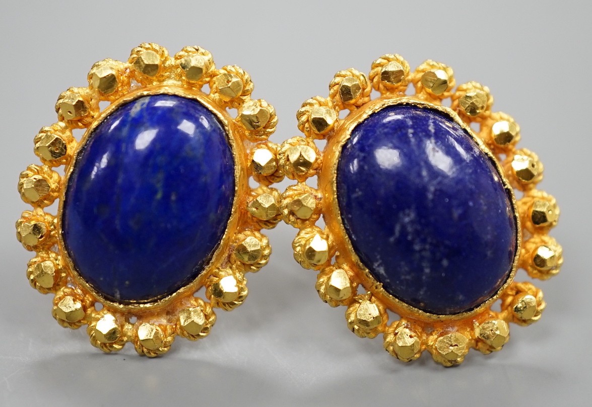 A pair of bright cut yellow metal and lapis lazuli set oval earrings, 20mm, gross weight 9.5 grams.